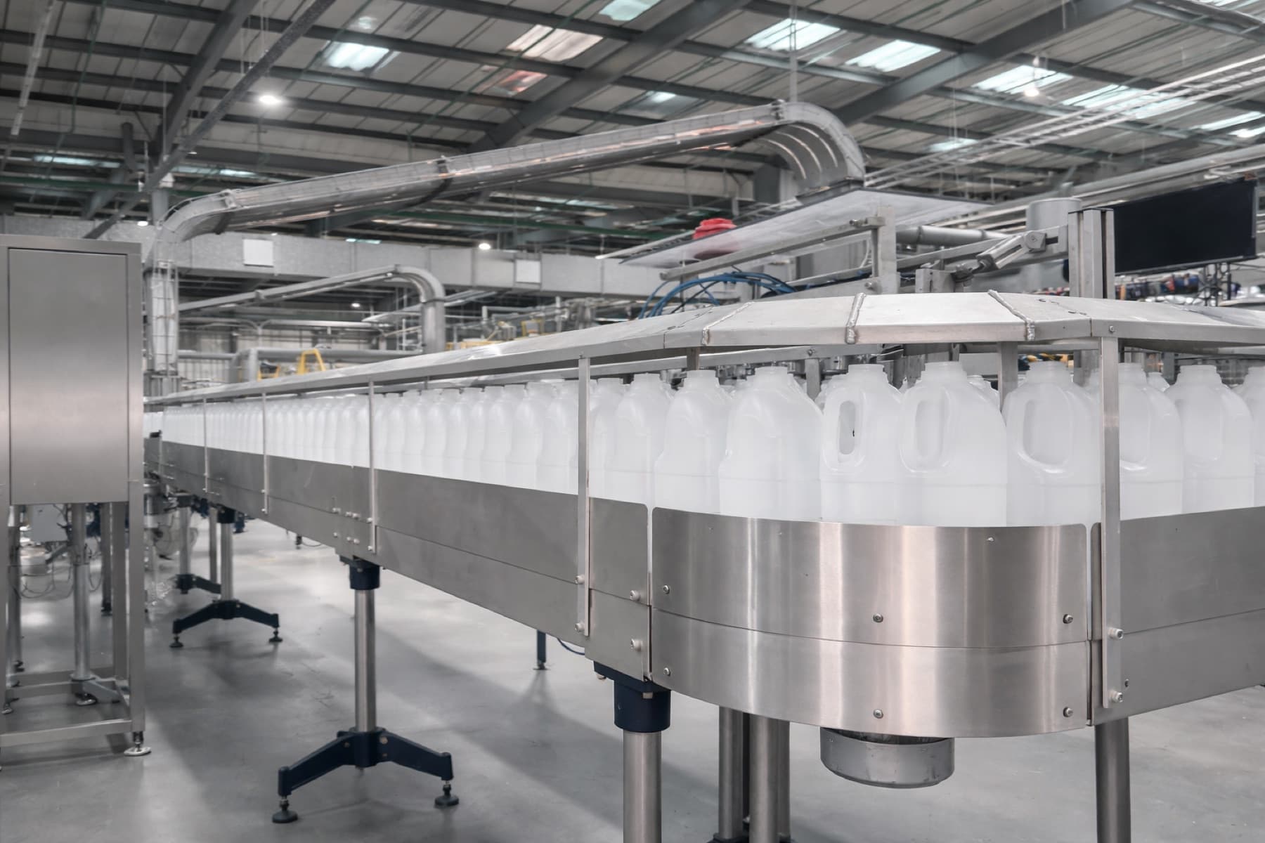 Milk bottles on the conveyor